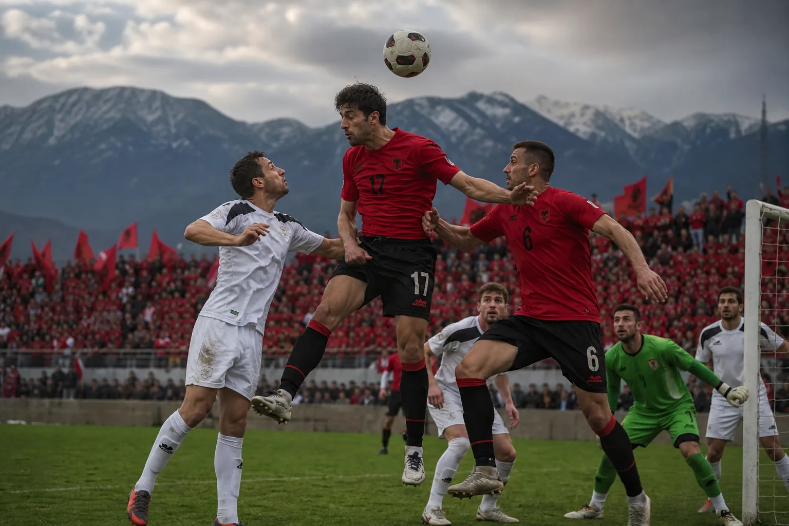 Fictional Albanian footballers contesting a fierce international match beneath mountain stands