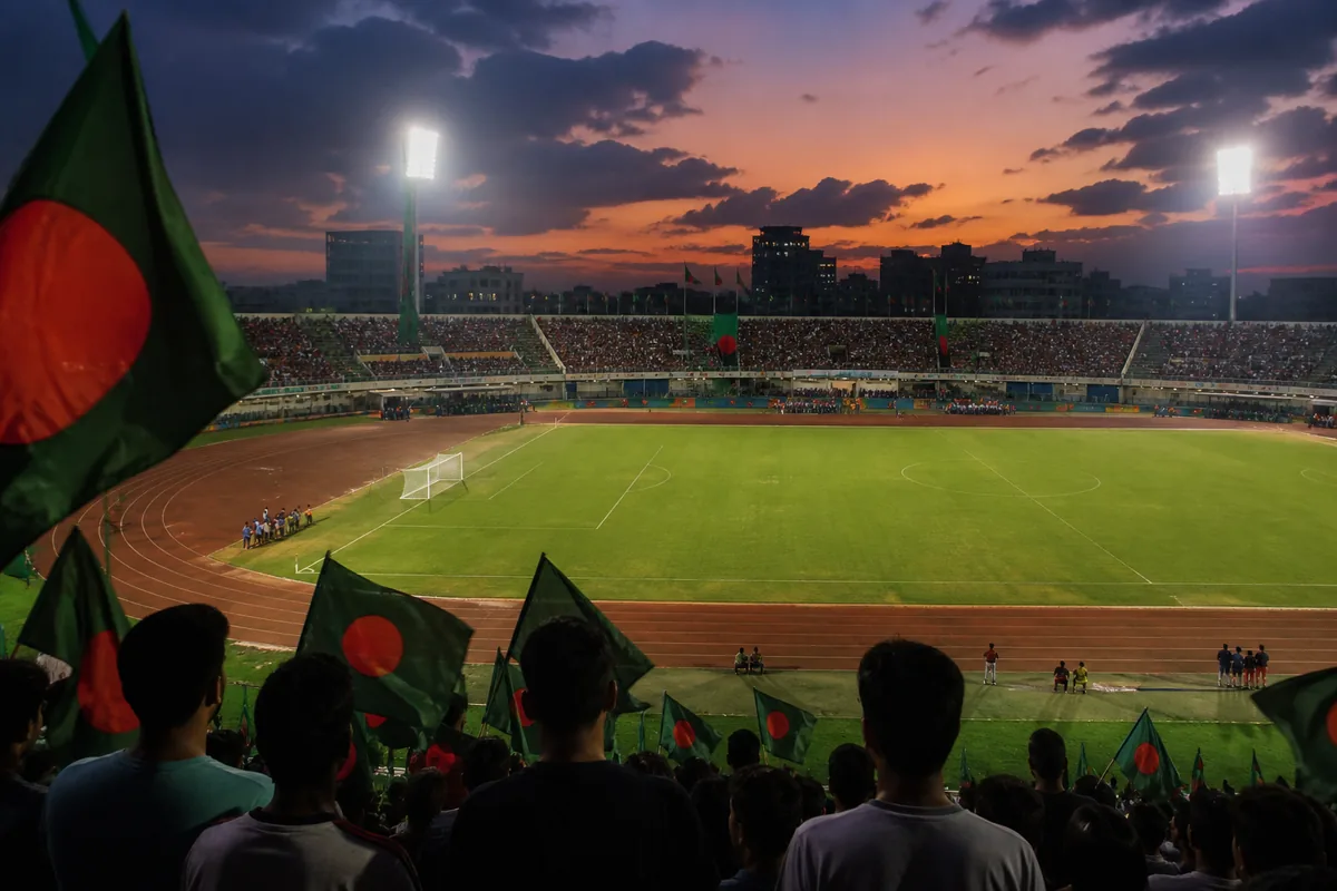 A Dhaka football stadium-inspired ground prepared for an international match with green-and-red flags