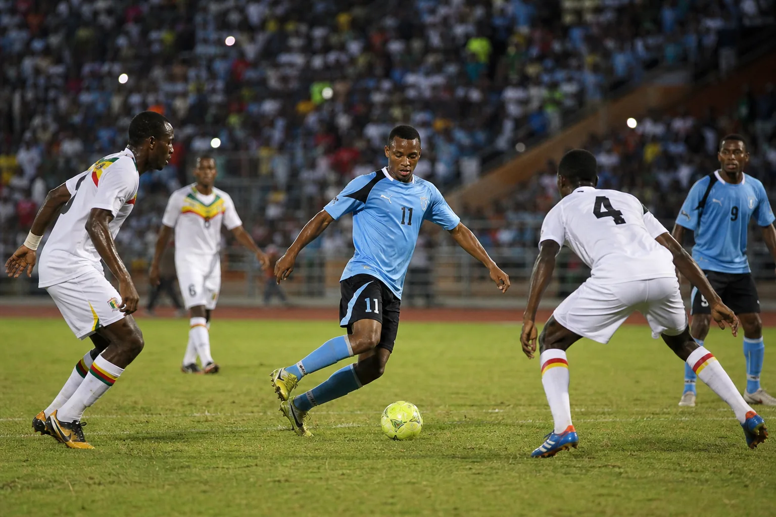Botswana's Zebras playing a disciplined African qualifying match on a dry football pitch