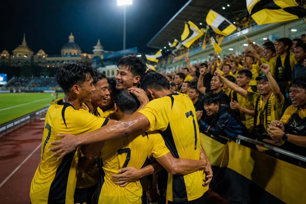 Fictional Brunei players celebrating an important Southeast Asian qualifying victory