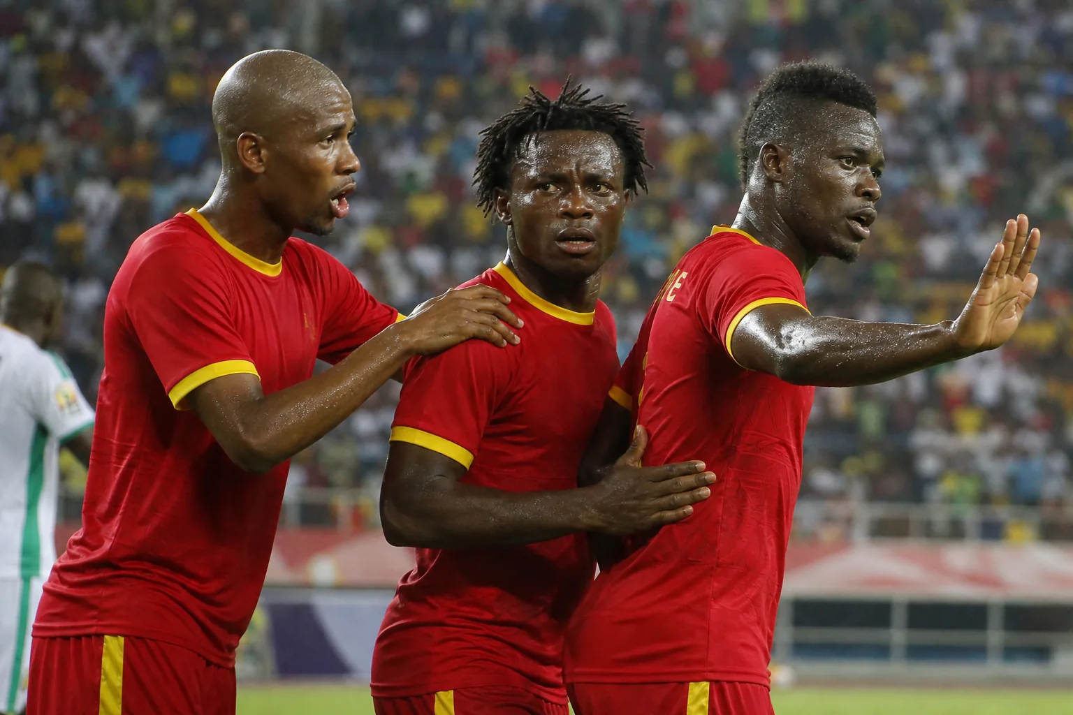 Technically gifted 1970s Republic of Congo footballers playing expressive attacking football on a classic African pitch