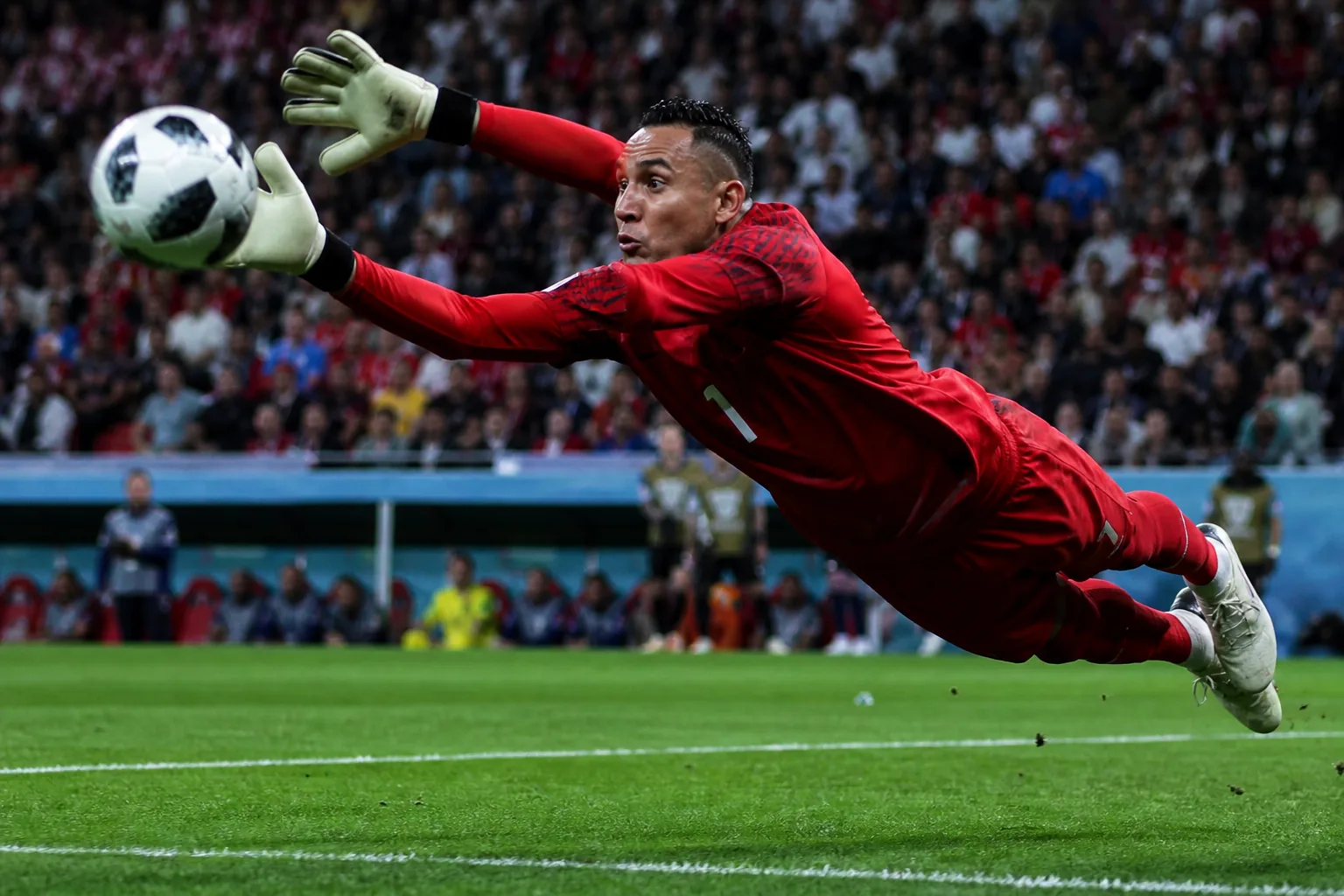 Costa Rican players celebrating their first World Cup knockout-stage breakthrough