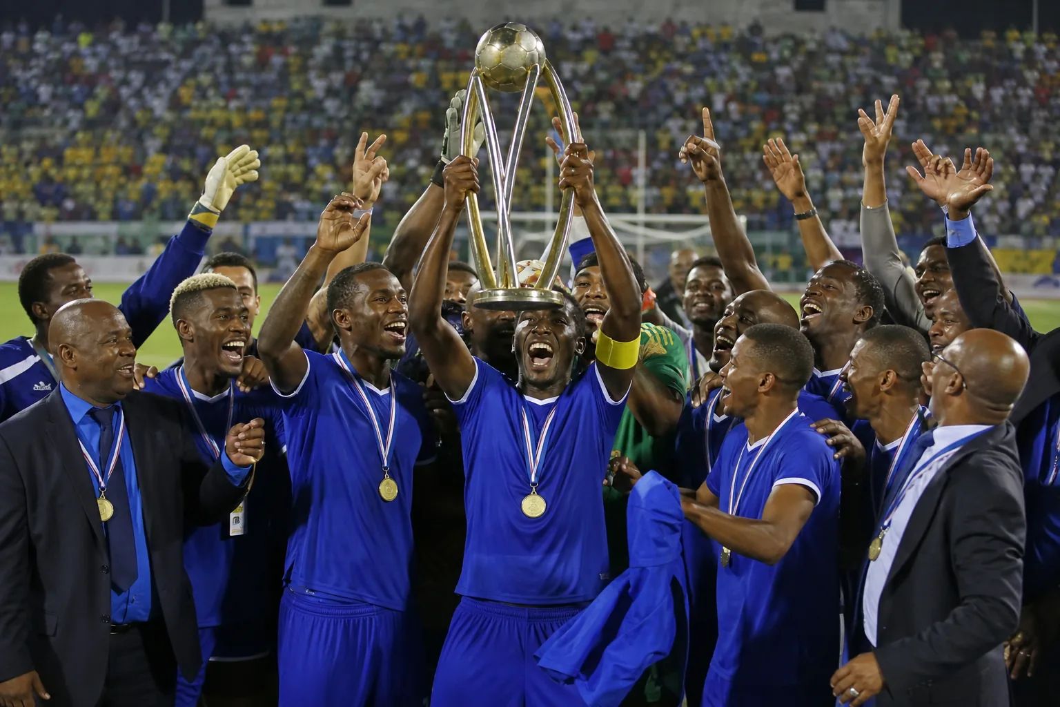 Curaçao national football team preparing together in blue kits before a major Caribbean match