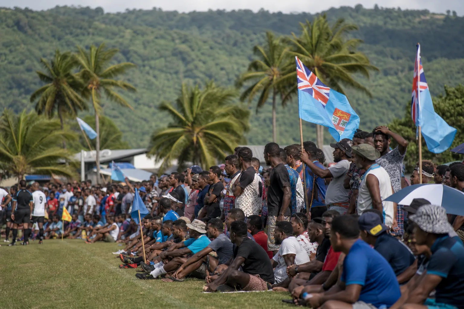 Fiji players competing in an intense OFC Nations Cup semi-final against a Pacific rival