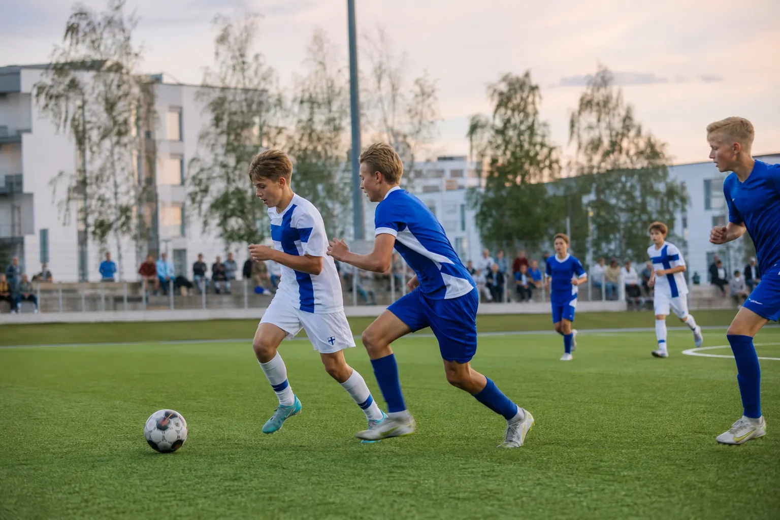 Young fictional Finnish footballers playing an energetic match in Helsinki