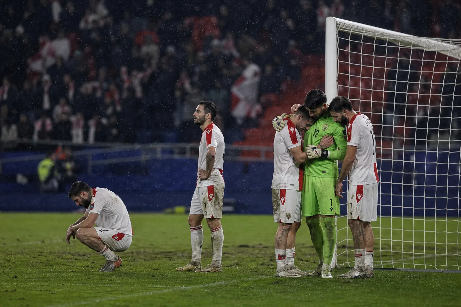 Fictional Georgian players reacting after a narrow qualifying setback