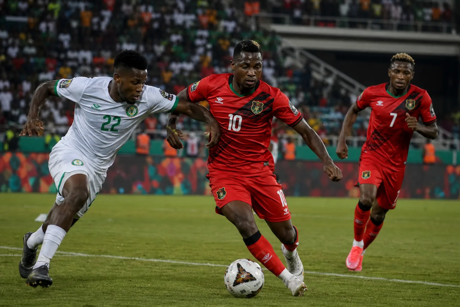 Malawi's Flames celebrating a historic AFCON knockout-stage breakthrough before passionate supporters