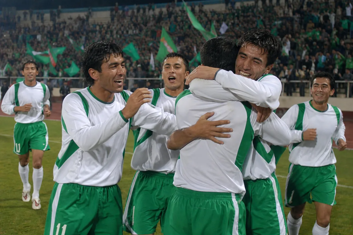 Fictional Turkmenistan players celebrating their 2004 Asian Cup qualification and first finals appearance