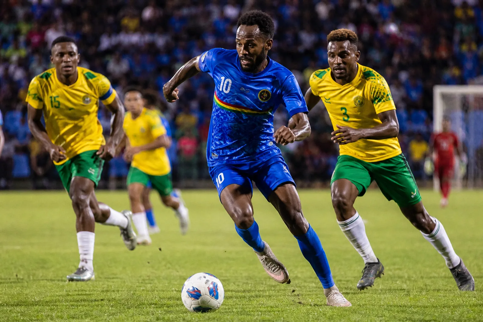 Vanuatu footballers playing attacking football in an intense Pacific regional tournament